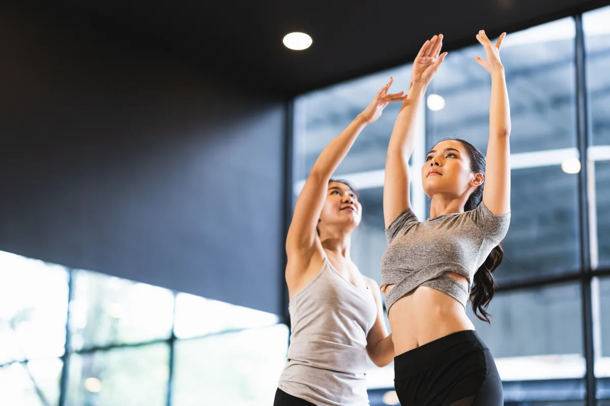 Dancers at the barre in a studio