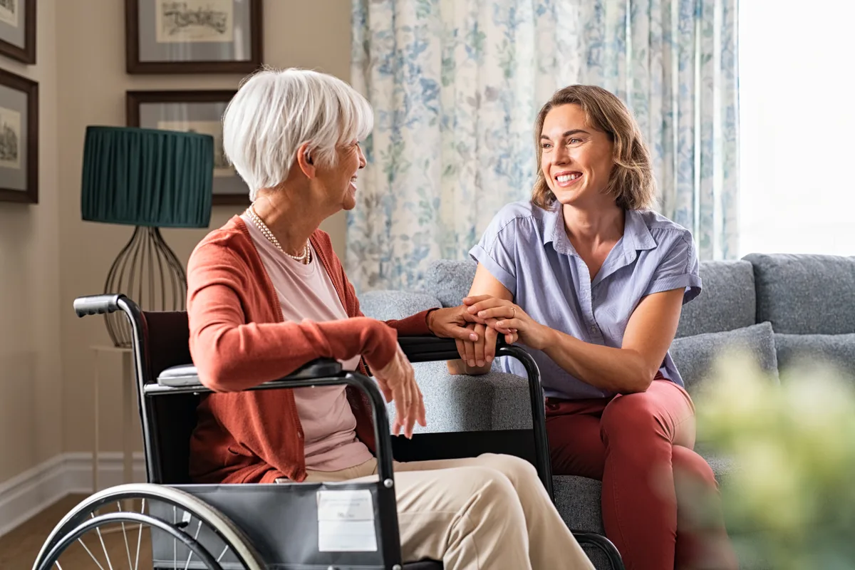 Caregiver assisting a senior at home