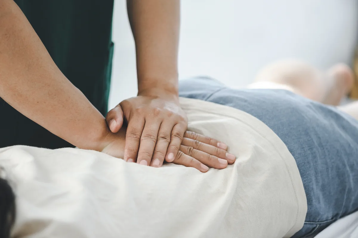 Chiropractor performing an adjustment