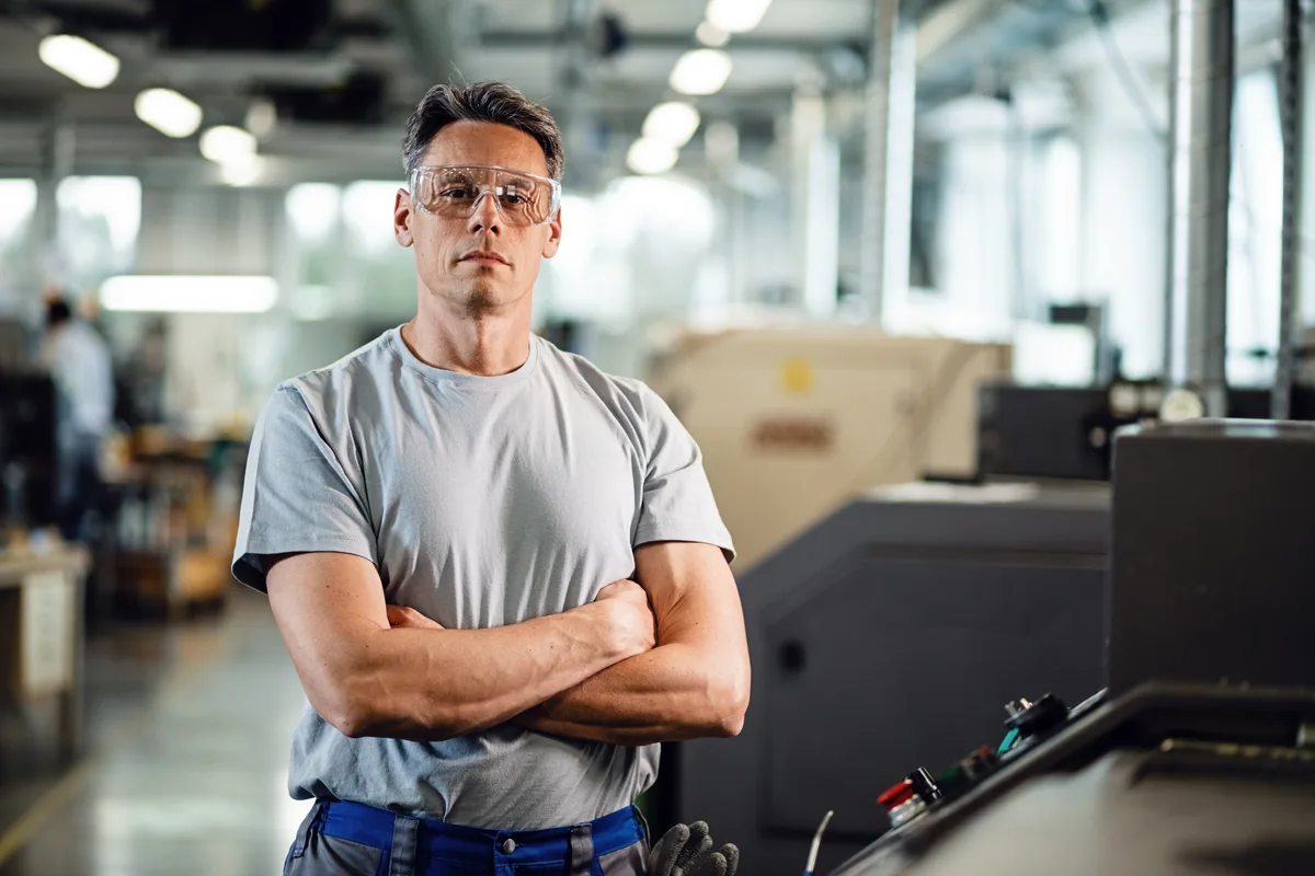 CNC machines running on a factory floor