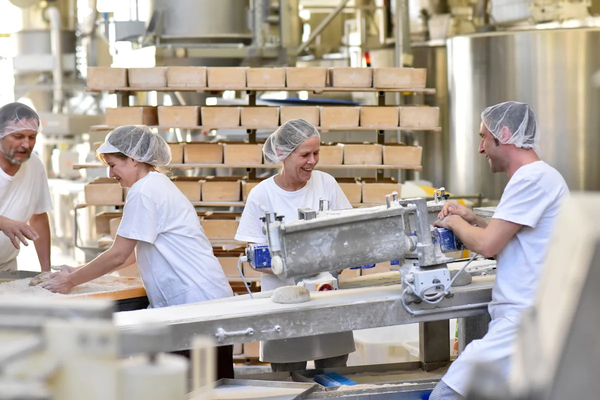 Workers on a food production line