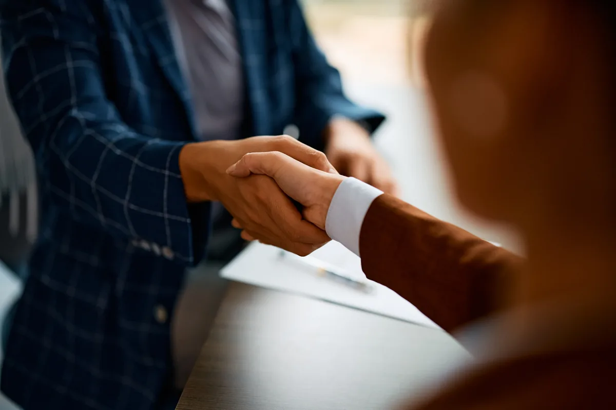 Insurance broker meeting clients in an office