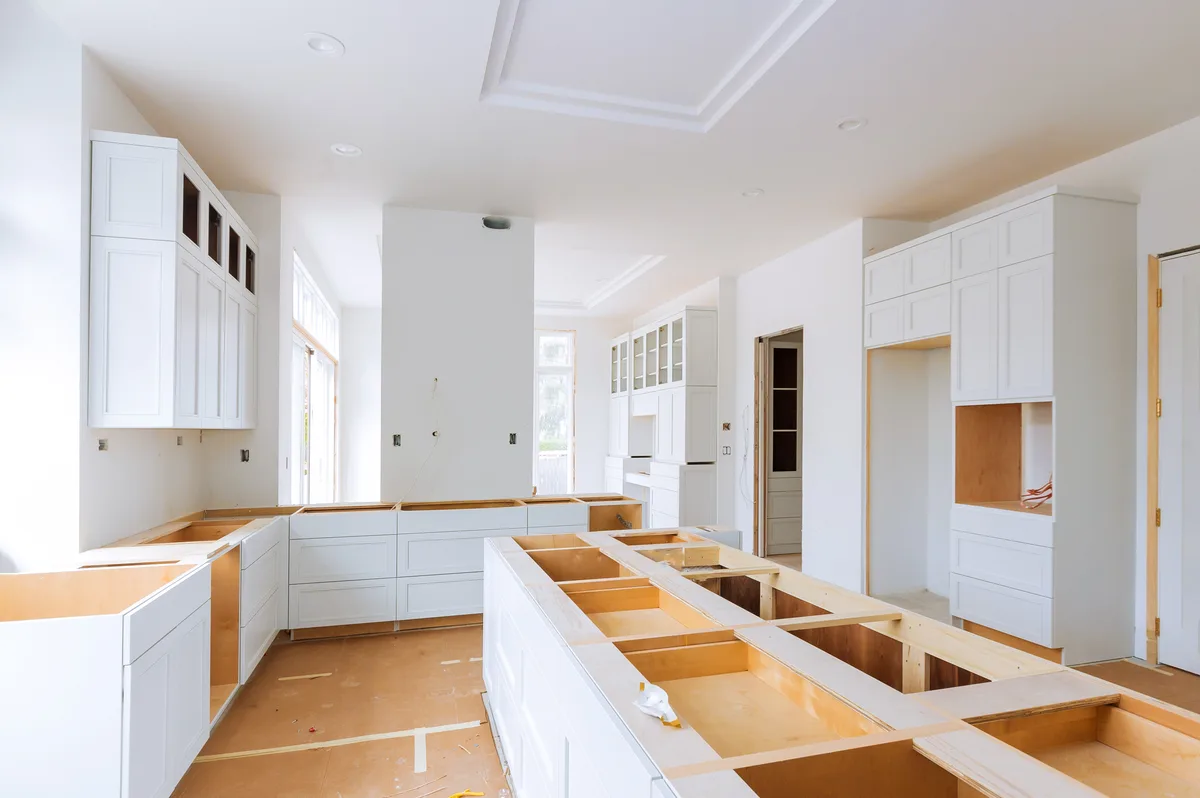 Renovation crew installing a kitchen