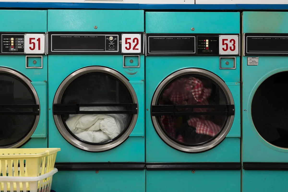 Rows of machines in a laundromat