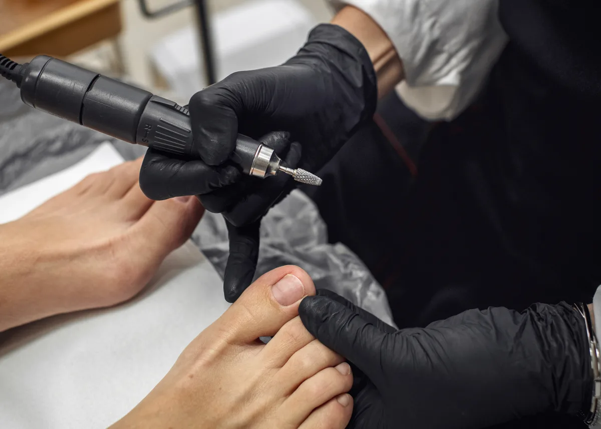Nail technician doing a manicure