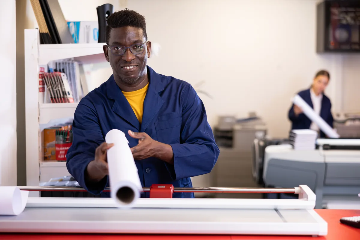 Large-format printer running in a print shop