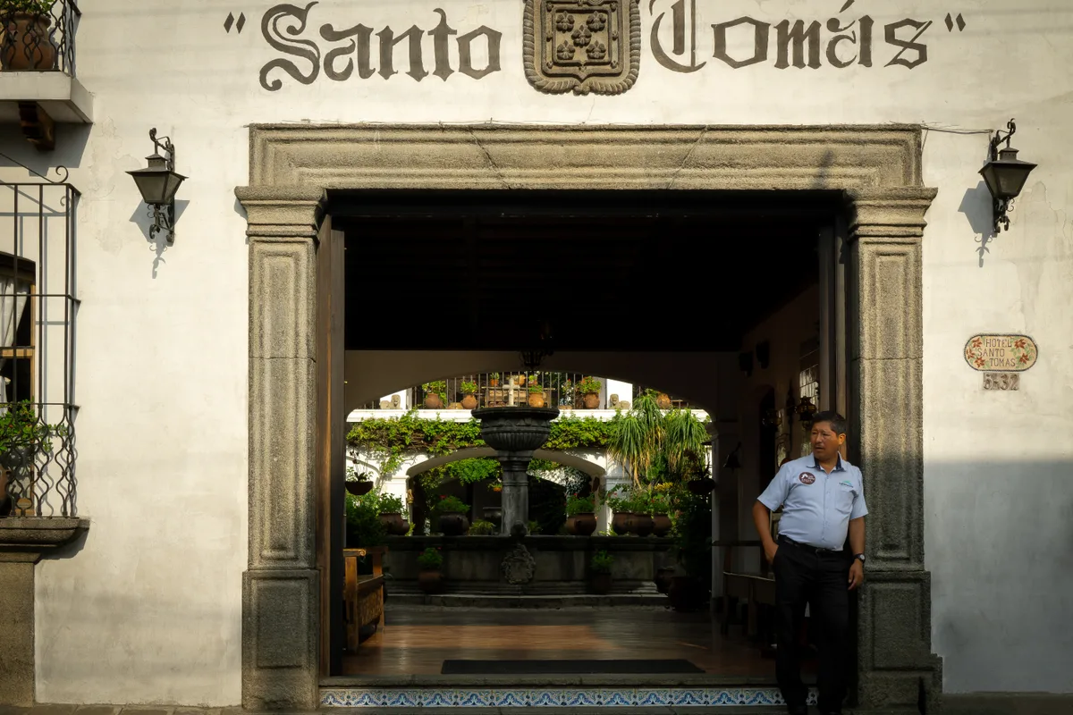 Security guard at a building lobby desk