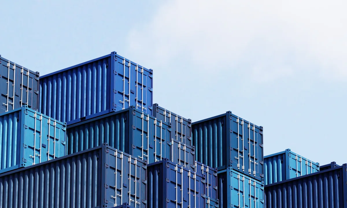 Shipping containers stacked at a port