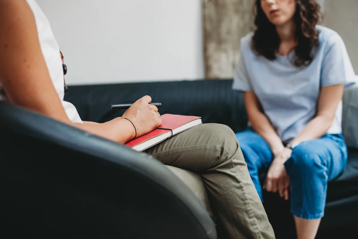 Therapist in session with a client