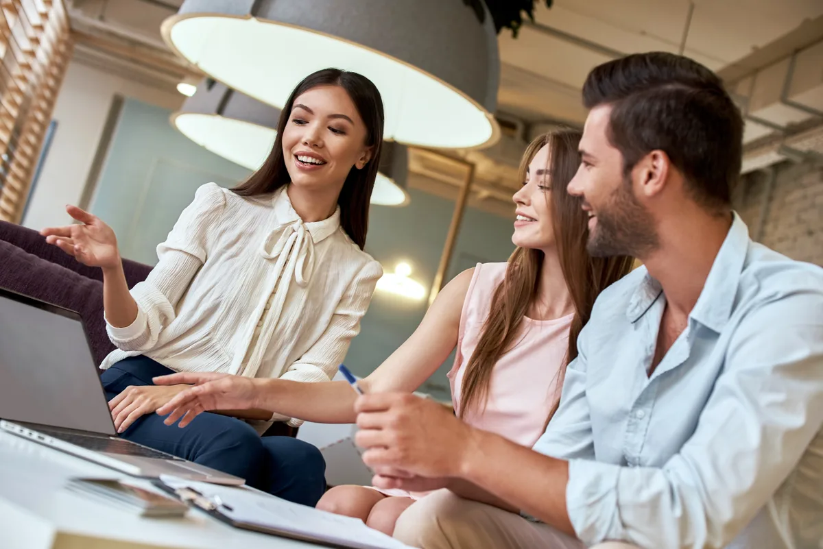 Travel agent planning a trip with clients